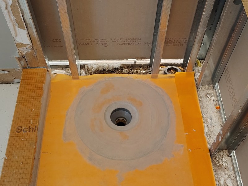 Shower drain waterproofing with Schluter system